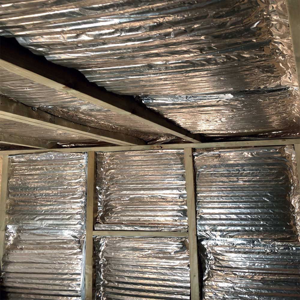 Inside a garden room showing reflective insulation
